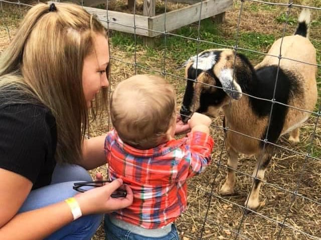 Petting the goats at Harvest Moon Acres (Gobles, MI)
