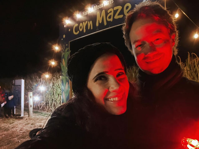 Couple enjoying flashlight nights at Harvest Moon Acres (Gobles, MI)